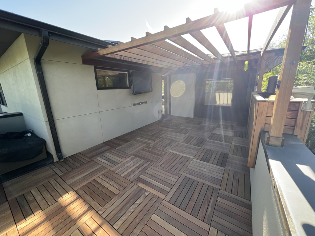 Rooftop deck designed with pergola and durable materials for all-weather use in Denver, Colorado.