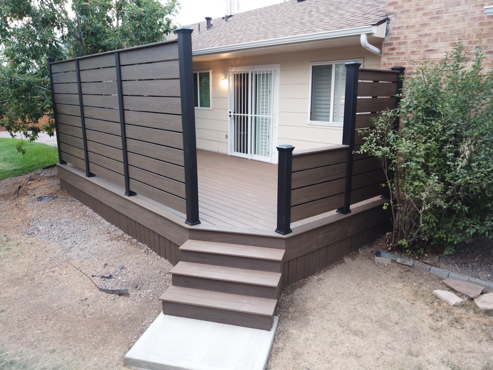 Custom-built deck featuring a privacy fence for elevated living in Denver, Colorado.
