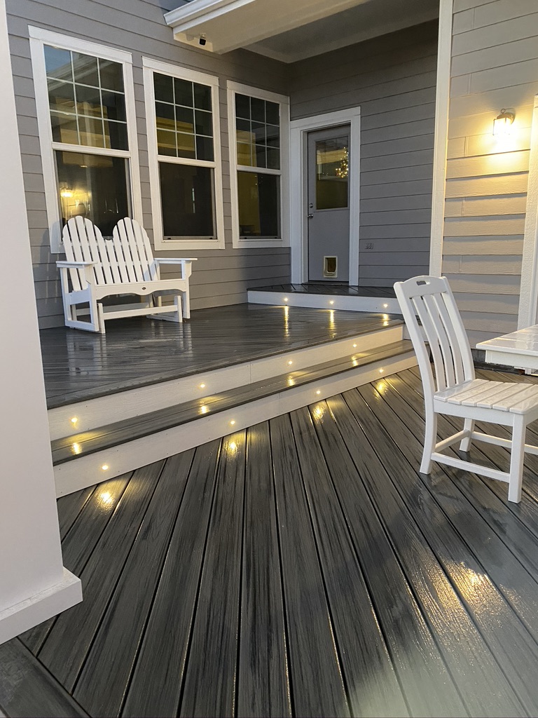Outdoor Deck with lighted steps. Custom built by Elevated Outdoor Living Co in Denver Colorado.